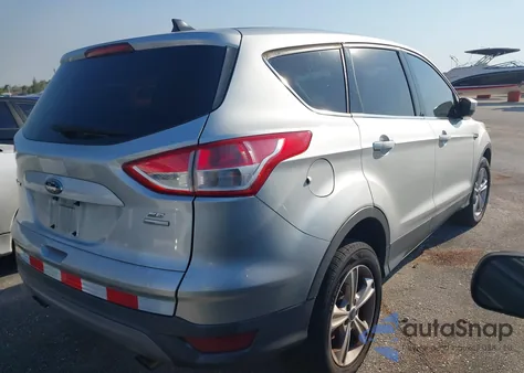 2013 Ford Escape Se z USA, uszkodzony, nr VIN 1FMCU9GX4DUB09144